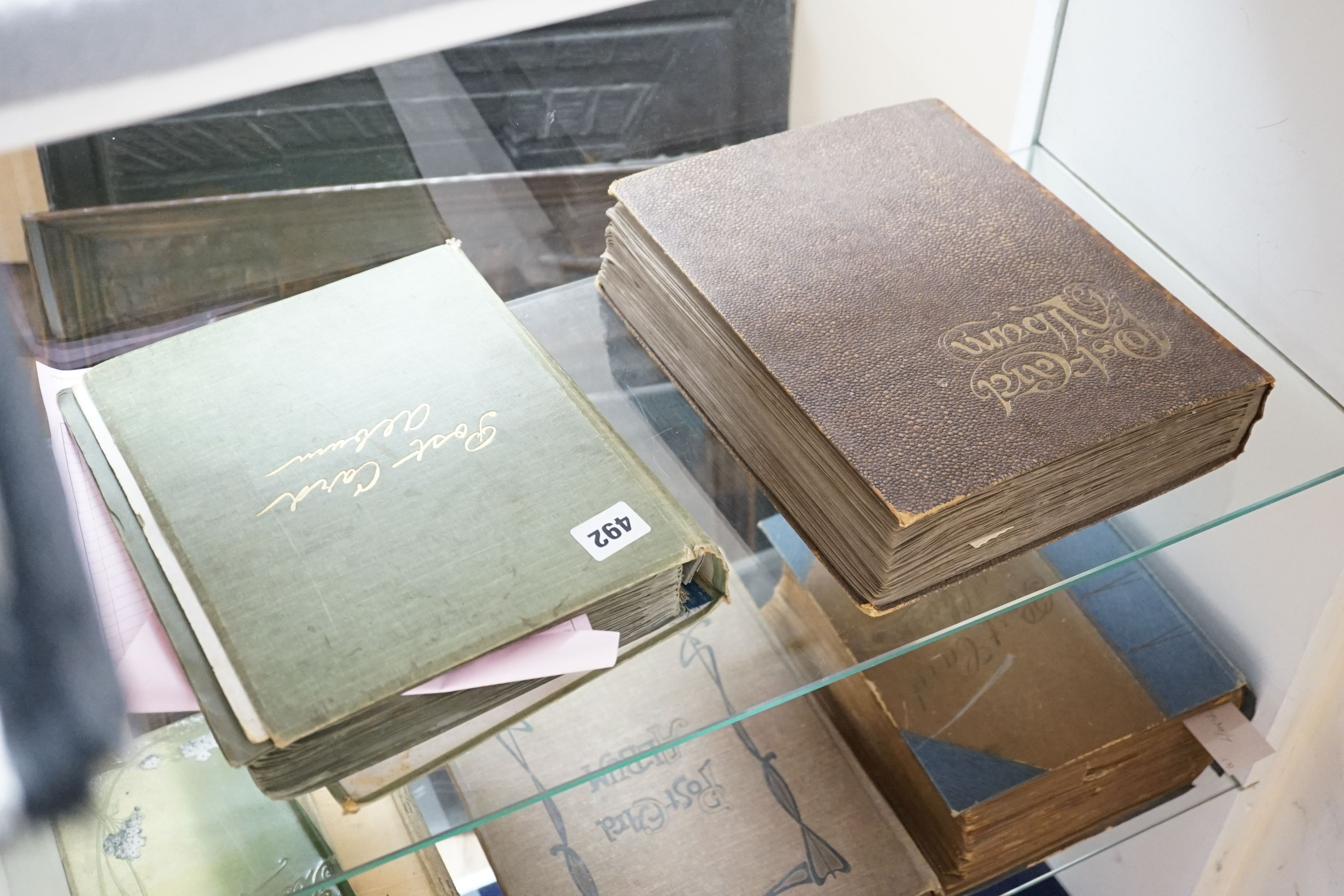 Two postcard album and contents